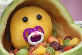 funny fruit with a pacifier