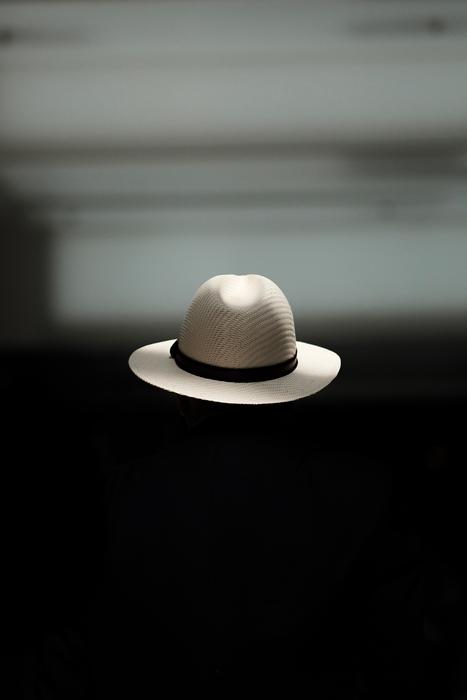 photo of flying white hat