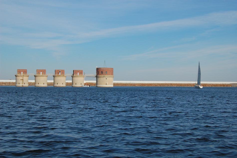 stone wall with the blue sea