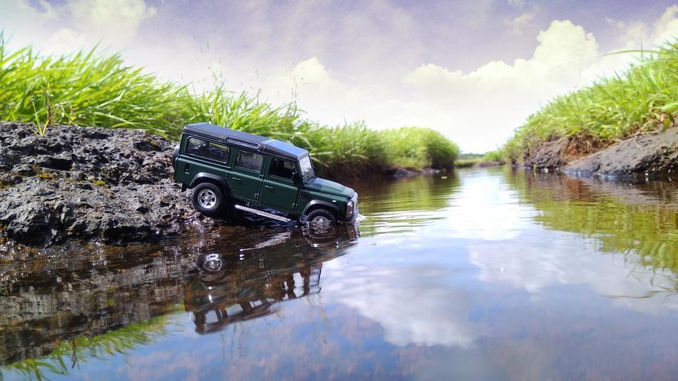 Photography of truck on lake