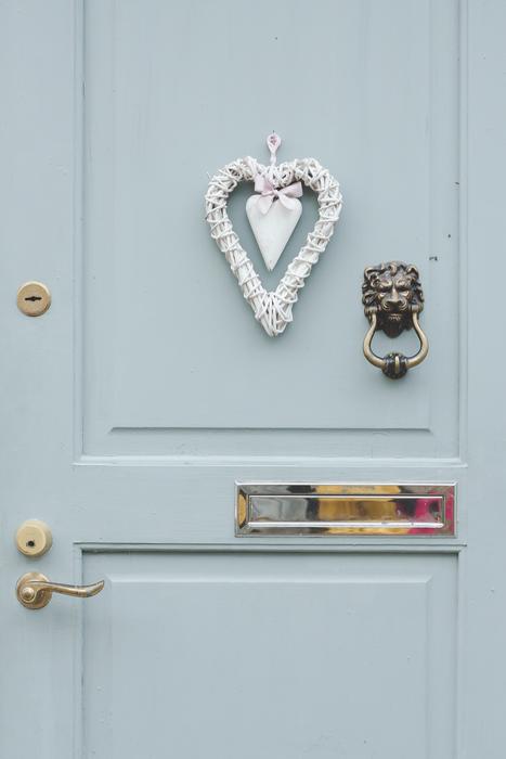 a white heart on an old door