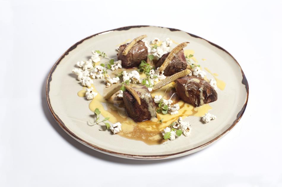meat on plate in sauce
