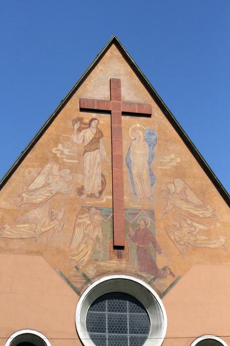 The cross on the roof of the church