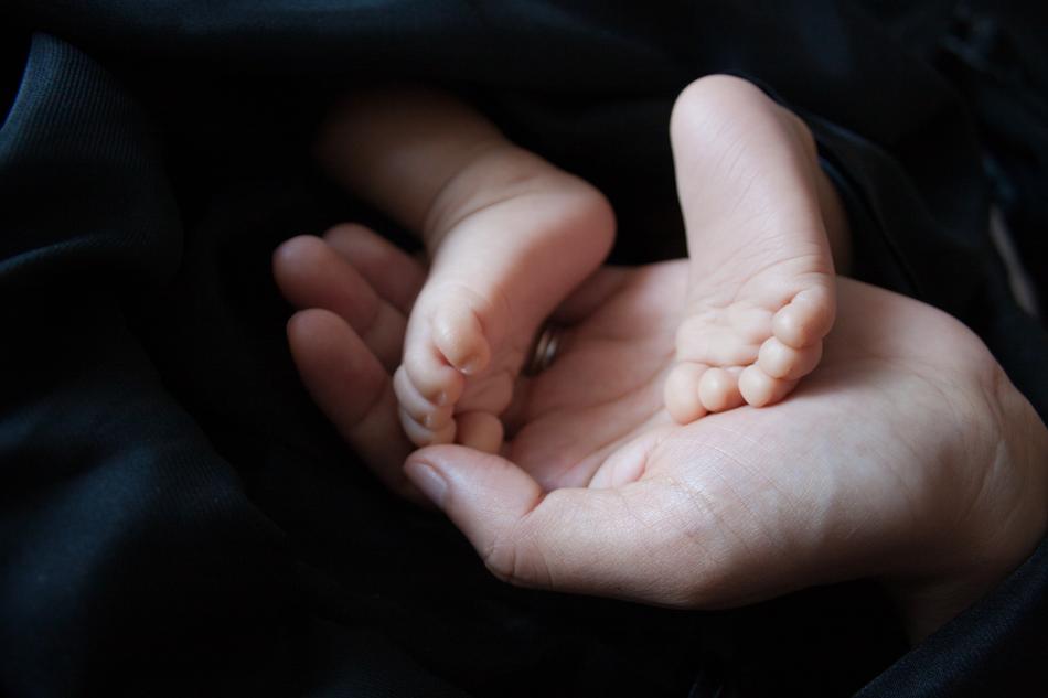 Cute Baby Feet on hand