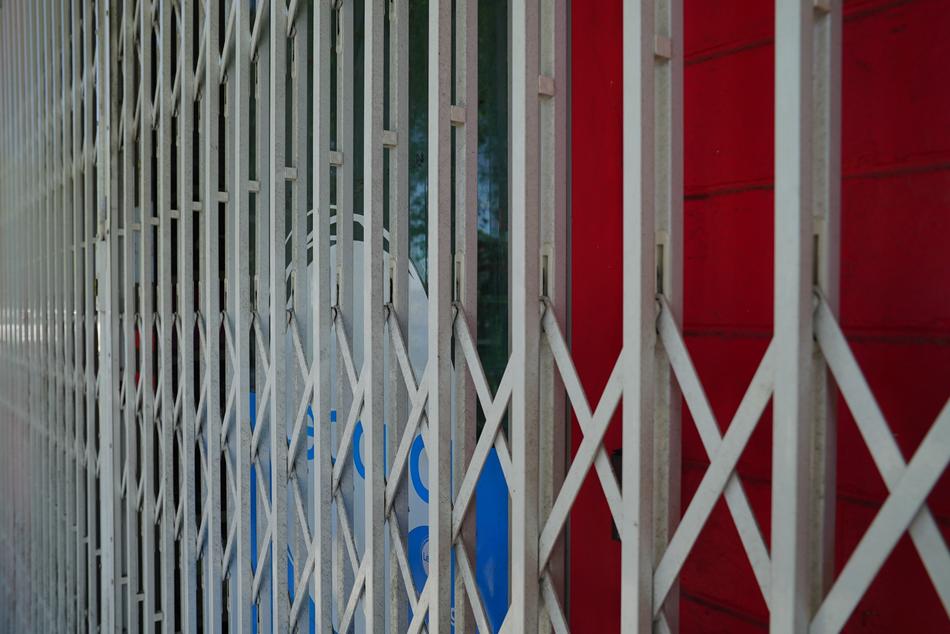 Old collapsible gate near the building