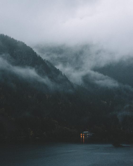 mountainous terrain in the clouds