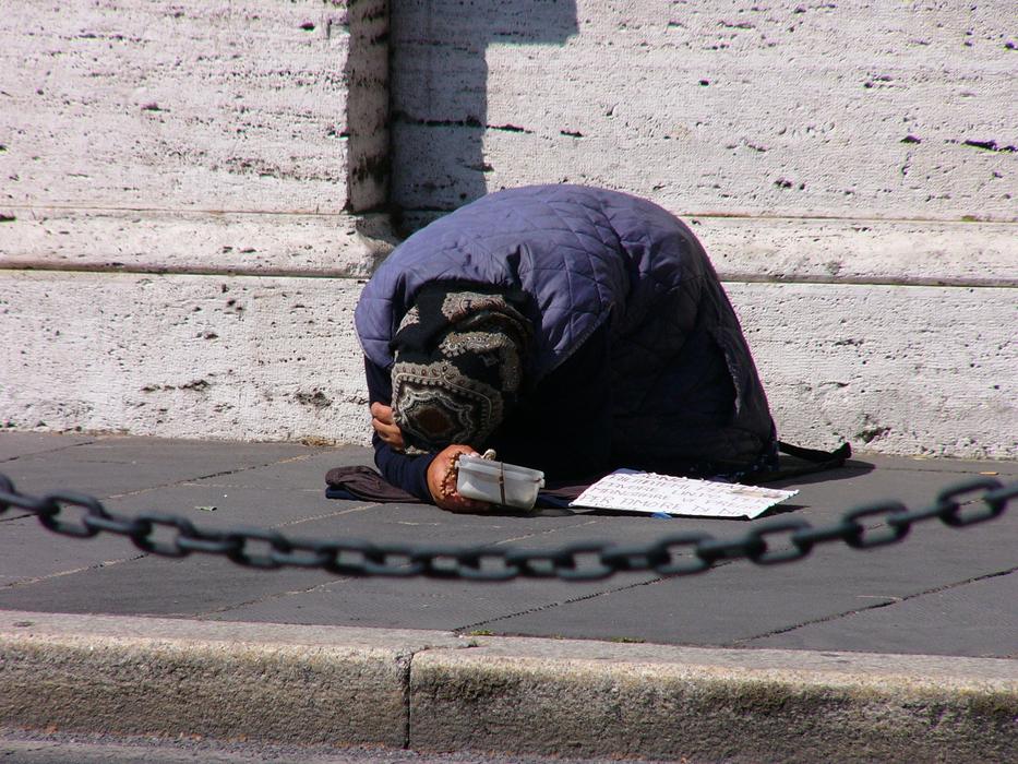 praying man on the ground