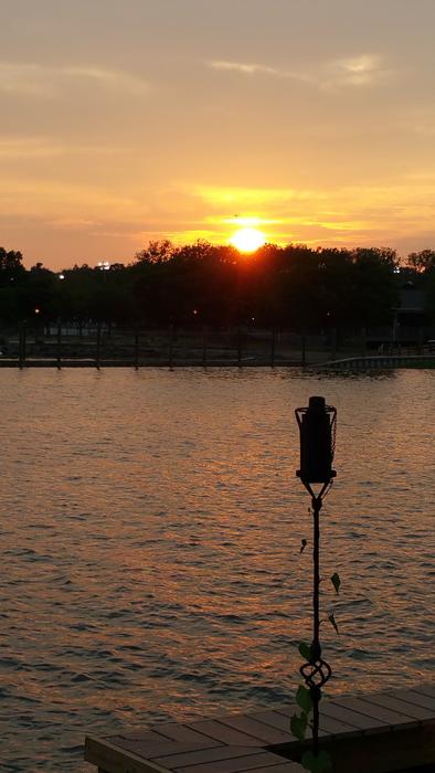 dark silhouette of a lantern in the evening