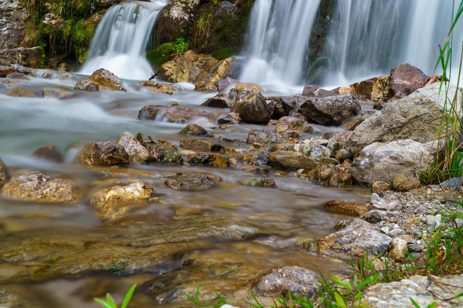 stone lake with a waterfall