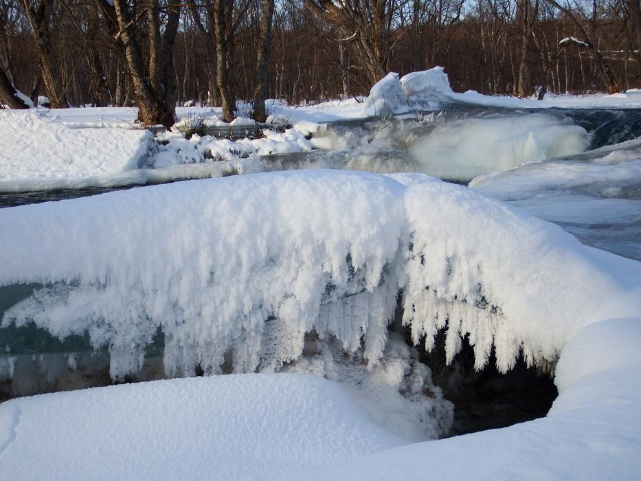 snowy weather on the rocks landscape