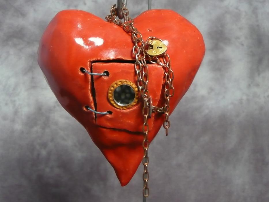 red heart with a chain