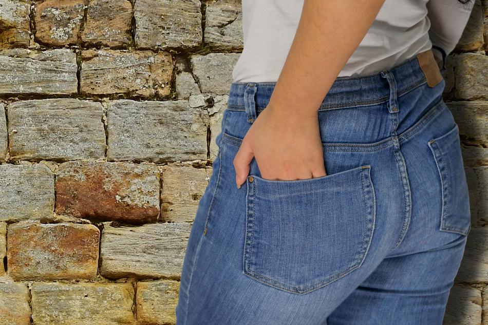 Woman Hand Jeans