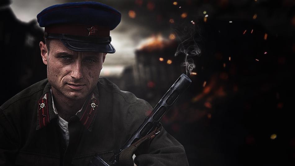 a man with a weapon on the background of hostilities