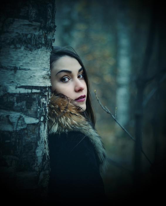 Portrait of Fashion Woman in forest