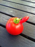 funny tomato on the table