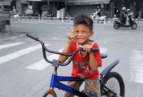 Kid on bike in Vietnam