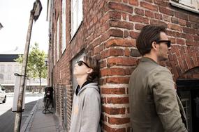 people in Sunglasses near Building