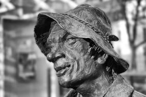 black and white, head sculpture with a hat