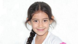 photo of a girl with a pigtail on a white background