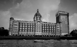 black and white building by the river in Maharashtra, India