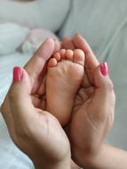 Foot Child in Hands