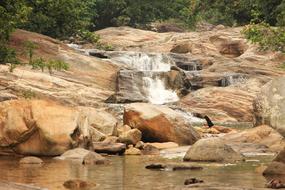 waterfall in a stone wall
