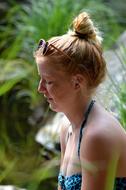 Profile portrait of the blonde girl with the glasses