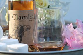 beautiful alcoholic drink on the background of flowers