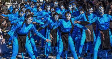 People in blue paint, on the Avatar carnival