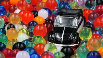 toy vw car in colorful balls