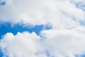 white incredible clouds in the blue sky