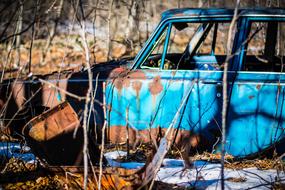 rusty abandoned car