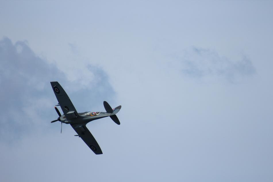 airplane in a cloudy sky