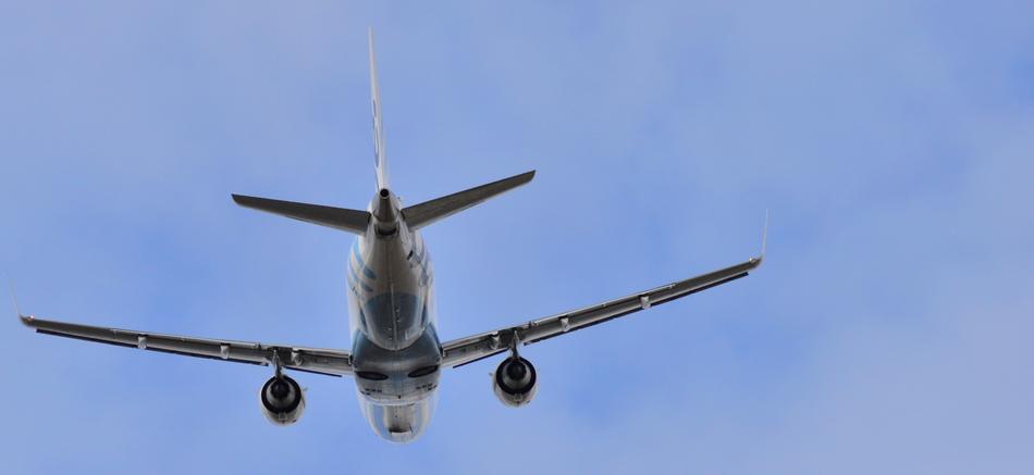 airplane taking off in the clear sky