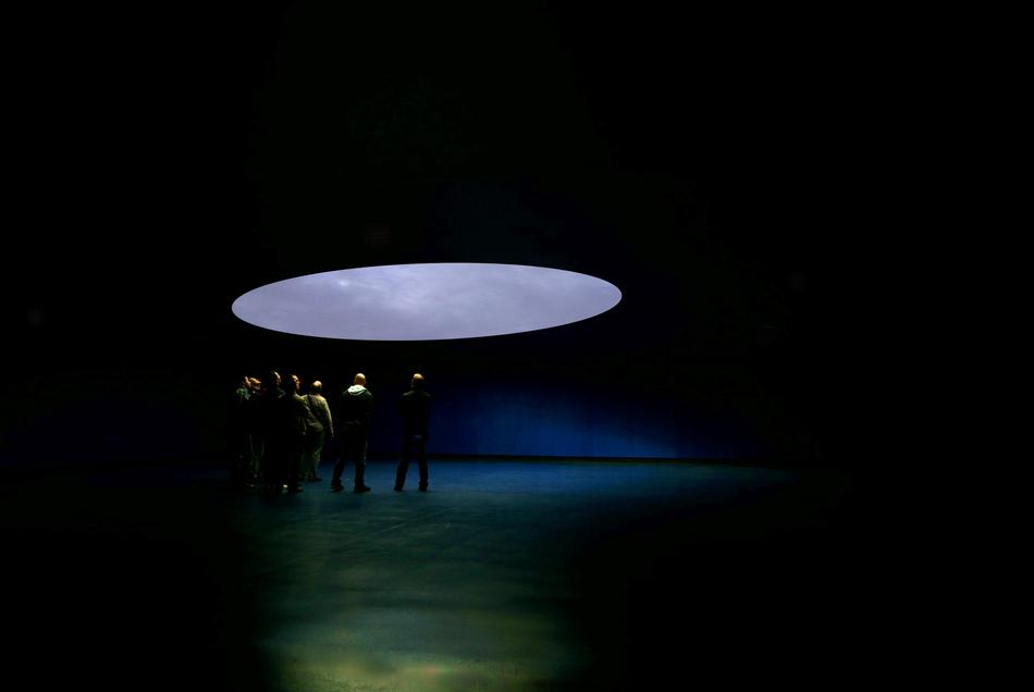 People, under beautiful hole with colorful light