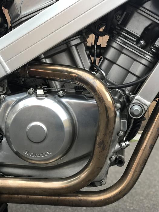 Close-up o the shiny details of the beautiful Honda Hawk motorcycle