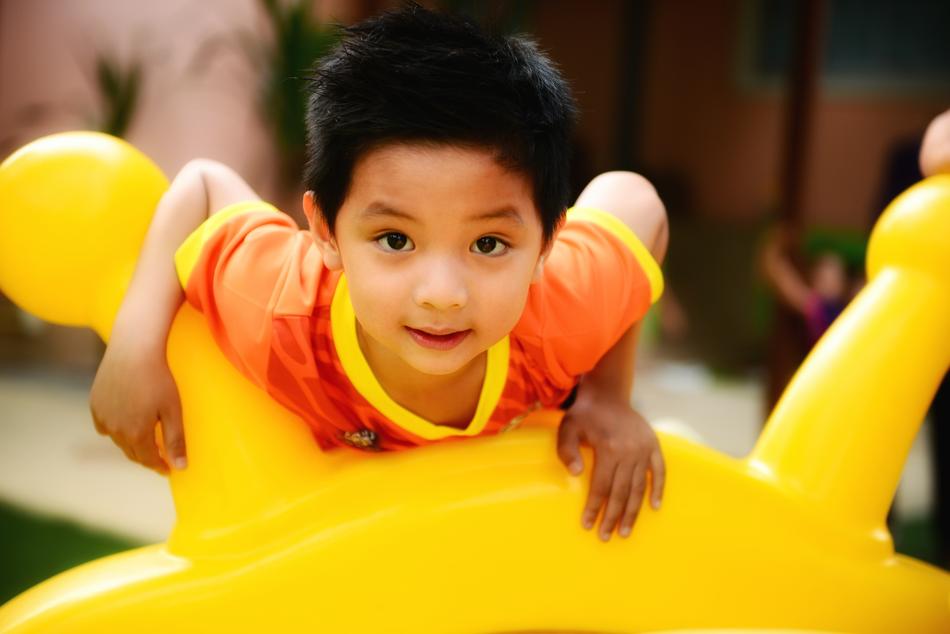 Asian kid on the yellow circle
