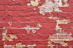 Texture of the old, red wall of the building