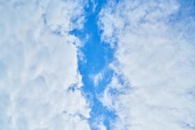 Blue Sky fluffy Clouds