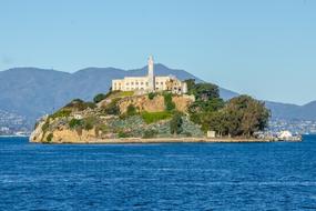 beautiful house in green trees in the sea