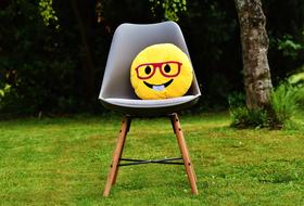 smiley face yellow with red glasses