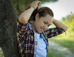 Potrait of girl Model near tree