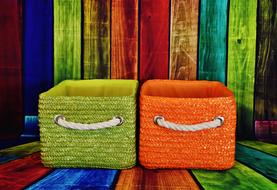 decorative baskets on the background of colorful boards