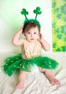 photo of a baby in a suit for St. Patrick's Day