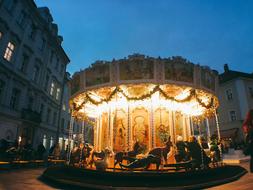 carousel on city street at night