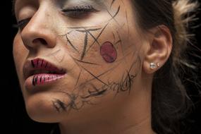 Woman face painted