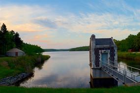Stone Building by lake at the sunset