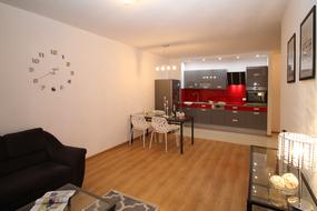 Interior of the kitchen in the apartment, with furniture, decorations and lights