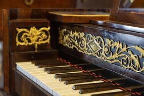 keyboard of an antique piano