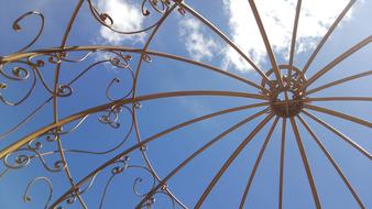 golden gazebo in the blue sky